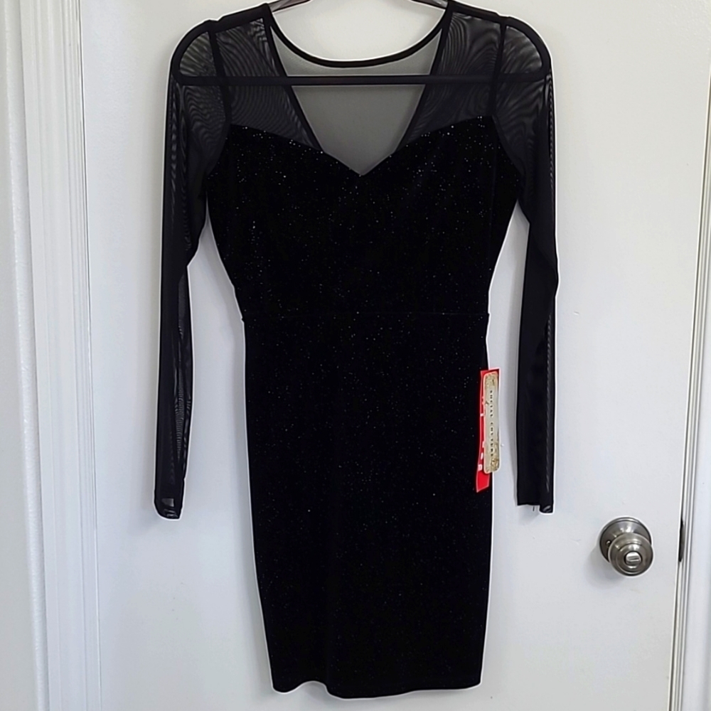 Black social culture dress with long sheer sleeves.  Brand new with tags